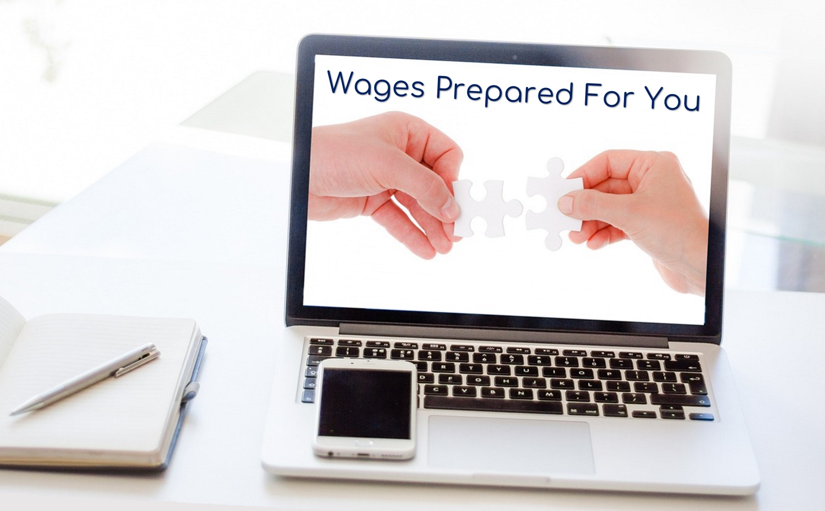 image of a computer with hands holding jigsaw pieces