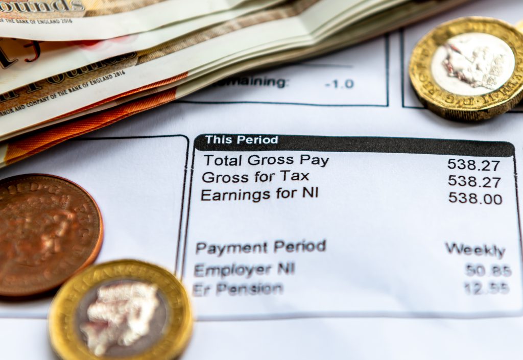 Image showing a payslip coins and notes
